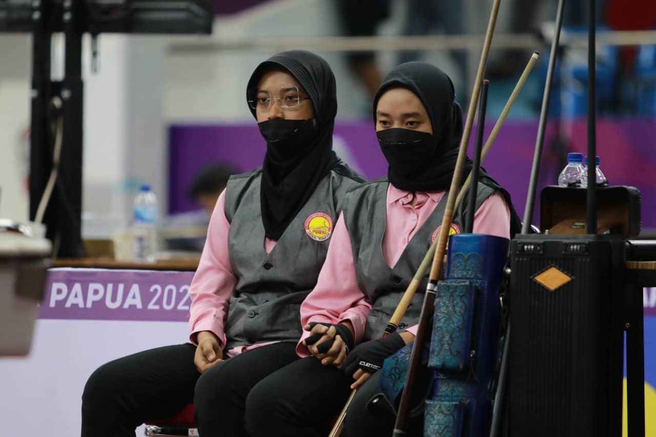 Ilustrasi berita GEBYAR PON PAPUA: Kakak Beradik Asal Jatim Rebut Tiket Semifinal Biliar 9 Ball Double Putri