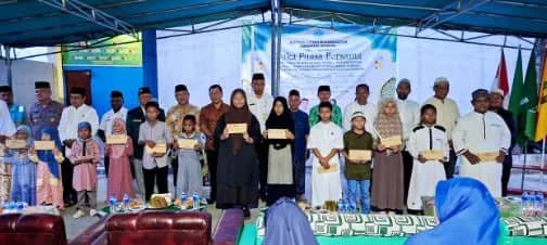Foto bersama Pimpinan Daerah Muhammadiyah Kabupaten Jayapura, perwakilan Pemkab Jayapura dan Forkopimda usai menyerahkan santunan kepada penerima, di SD Muhammadiyah Sentani. Rabu (04/03/2026)