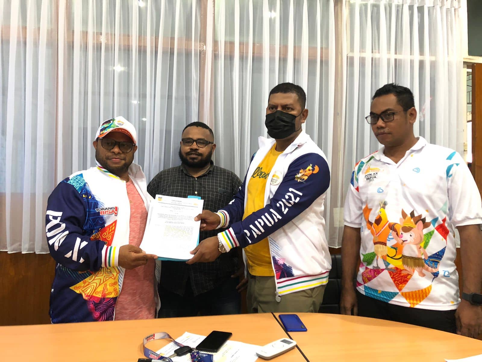 Penyerahan SK Relawan Sub PB PON Papua Kluster Mimika.