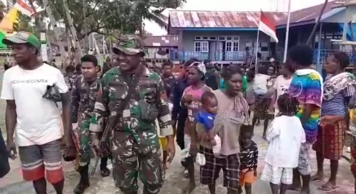 Ilustrasi berita MIMIKA: Air Mata Kerinduan Menetes di Pelabuhan Atapo, Tangisan Warga untuk Kepulangan Ratusan Prajurit TNI