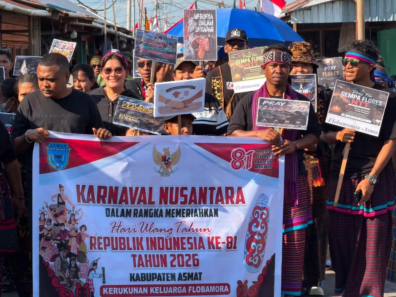 Ilustrasi berita Papua: Kenakan Busana Duka, Flobamorata Tampil Serba Hitam di Karnaval Budaya Nusantara Asmat, Empati untuk Korban Gempa Flores
