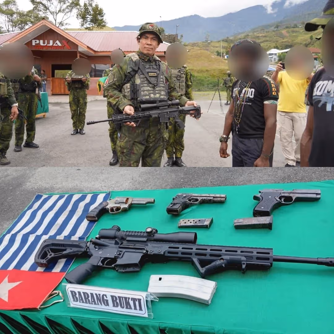 Pangkoops TNI Habema Brigjen TNI Riyanto saat menerima empat pucuk senjata dalam Upacara Reintegrasi Nasional di halaman Makodim 1714/Puncak Jaya, Sabtu (26/9).