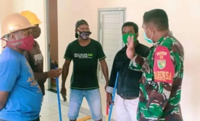 Ilustrasi berita Mimika: TNI Bersihkan Wisma Atlet Gedung Isolasi Pasien Covid-19 Mimika