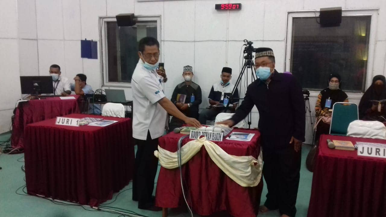 Penekan Tombol Pembukaan PTQ