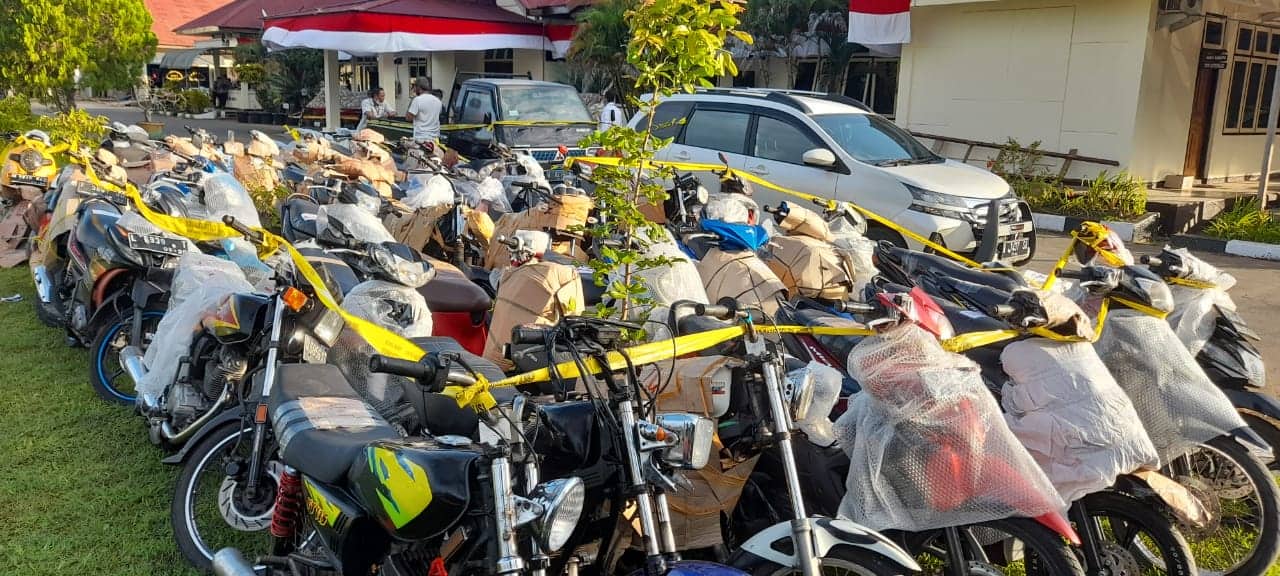 Ilustrasi berita Mimika: Diduga ‘Bodong’ Puluhan Kendaraan Diamankan Polisi Usai Dibongkar di Pelabuhan