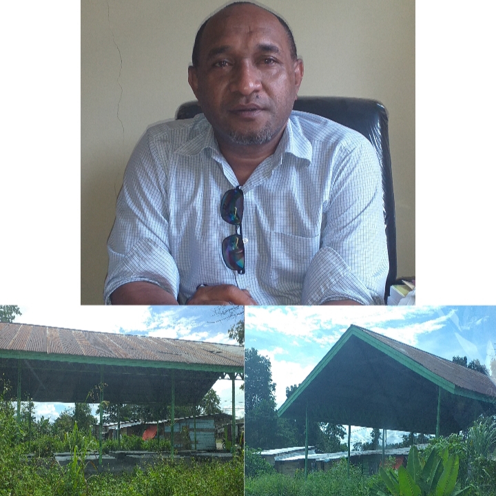 Kadistrik Wania Richard Wakum SE (atas) dan kondisi bangunan Pasar SP 1 yang mubazir (bawah)