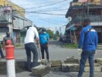 Akhirnya Dishub Mimika Bongkar Median Jalan Pasar Swadaya Menuju Serui Mekar