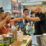 Barista dari Indonesia menyerahkan segelas kopi kepada pengunjung di pameran kopi Coffex Istanbul 2021