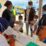Petugas kesehatan mengecek surat vaksin dari penonton yang akan menyaksikan perlombaan dayung di Teluk Youfena, Kota Jayapura, Kamis (7/10/2021)