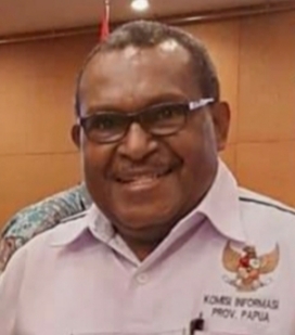 Wilhelmus Pigai, Ketua Komisi Informasi Provinsi Papua.