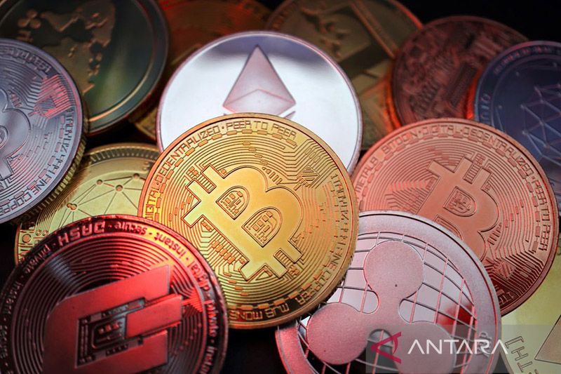 Ilustrasi - Representasi mata uang kripto termasuk Bitcoin, Dash, Ethereum, Ripple dan Litecoin.