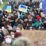 Para demonstran berkumpul selama protes anti-perang setelah Rusia melancarkan operasi militer besar-besaran terhadap Ukraina, di Berlin, Jerman, Minggu (27/2/2022).