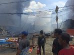 Sejumlah bangunan di Jalan Budi Utomo Timika, Papua terbakar pada Selasa (5/4/2022) siang.