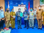 ATR/BPN Serahkan Sertifikat Tanah Pelabuhan Peti Kemas Depapre Kepada Pemkab