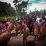 Plt Bupati Mimika, Johannes Rettob disambut tarian adat Kamoro saat menghadiri kegiatan di Nawaripi Dalam