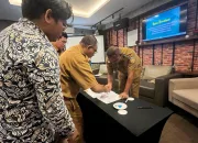 Pemkab Jayapura Dengan YP2K Papua Lakukan MOU Tingkatkan Pencatatan Kelahiran dan Imunisasi di Kabupaten Jayapura.