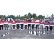 Dihadiri Dua legenda Persipura, Penjabat Bupati Luncurkan Gerakan Nasional Pembagian 10 Juta Bendera Merah Putih di Kabupaten Mappi