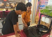 PLN UP3 Manokwari Dukung UMKM Food Festival dengan Kompor Listrik Ramah Lingkungan